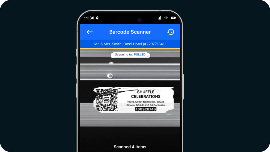 Event professional scanning damaged barcode label in dim lighting conditions.